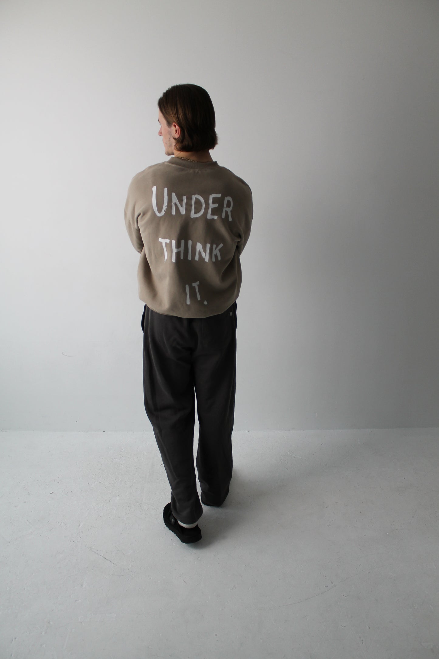 ‘Under think it’ back print stone sweatshirt